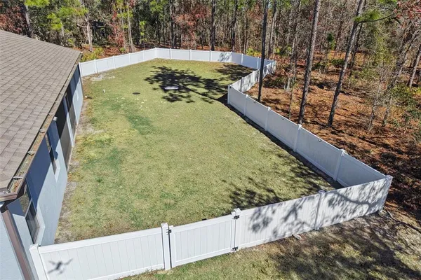 a view of swimming pool from a balcony