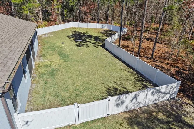 a view of swimming pool from a balcony
