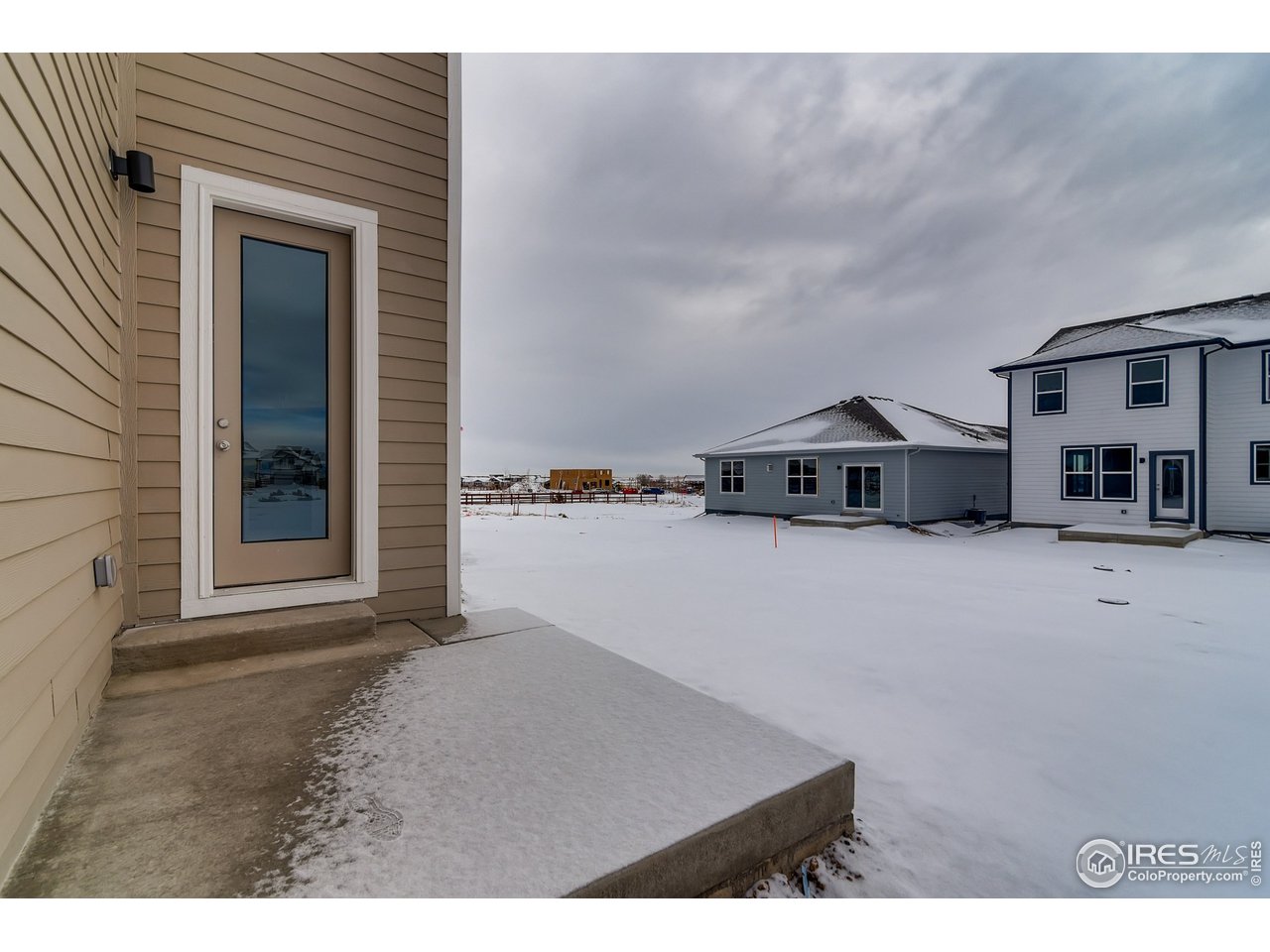 2147 Gather Drive Windsor, CO 80550 - Photo 26 of 28 a view of a house with a car park side of it