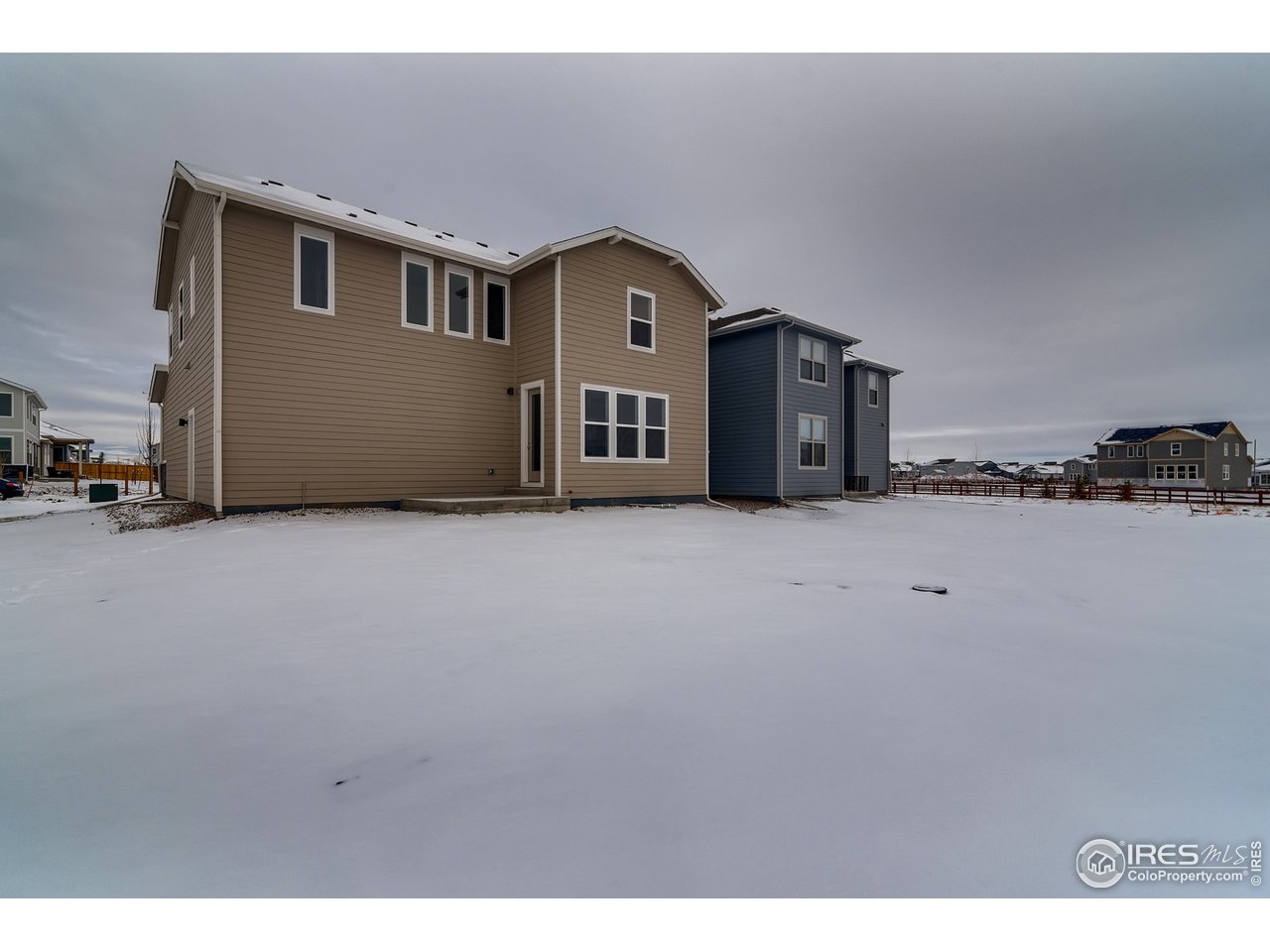 2147 Gather Drive Windsor, CO 80550 - Photo 27 of 28 a living room with furniture