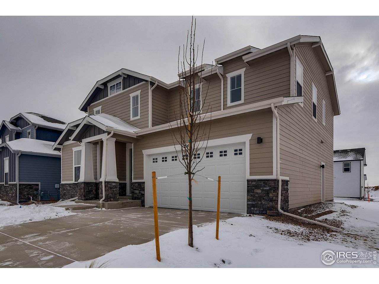 2147 Gather Drive Windsor, CO 80550 - Photo 3 of 28 a house view with a outdoor space