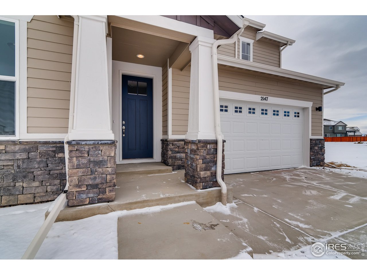 2147 Gather Drive Windsor, CO 80550 - Photo 4 of 28 a view of front door of house