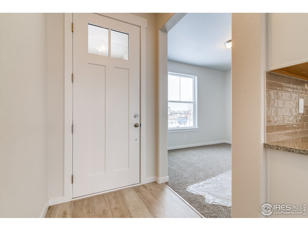 2147 Gather Drive Windsor, CO 80550 - Photo 5 of 28 a view interior of the house and wooden floor