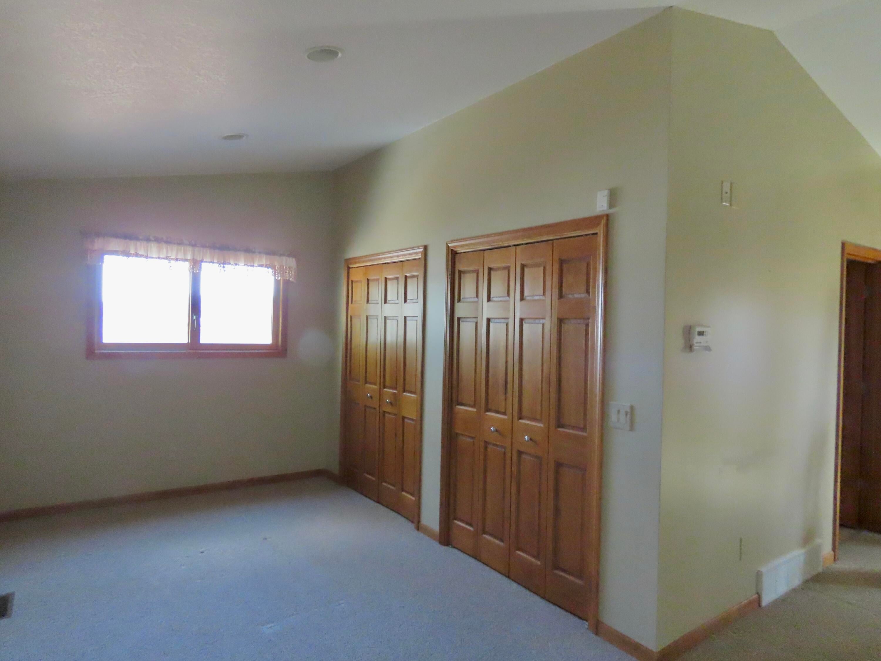 14150 Pointe Road Atlanta, MI 49709 - Photo 49 of 85 upper bedroom