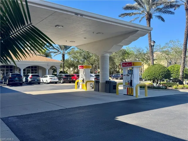 a view of a street with sitting area