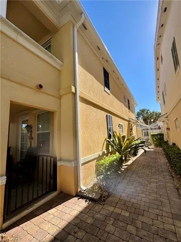 a view of a balcony with chairs