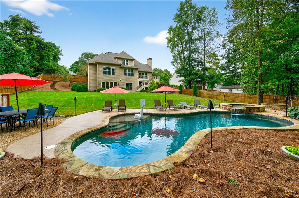 5250 Kendalls Way Cumming, GA 30041 - Photo 2 of 42 an aerial view of a house