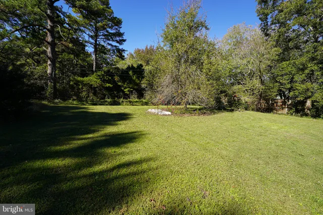 a view of a golf course with a yard