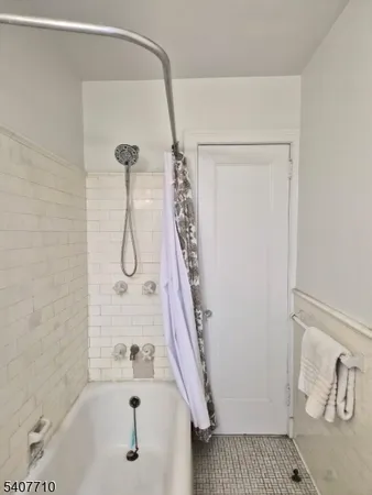 a bathroom with a bathtub