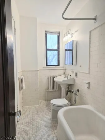 a bathroom with a sink and a bathtub