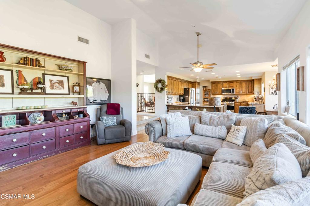 1308 Gonzales Road Simi Valley, CA 93063 - Photo 19 of 48 a living room with furniture kitchen and a chandelier