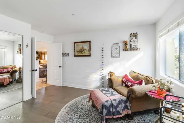 a bedroom with a bed and furniture