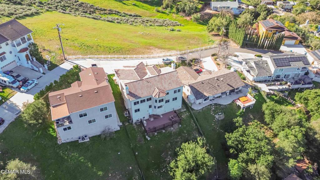1308 Gonzales Road Simi Valley, CA 93063 - Photo 39 of 48 an aerial view of residential houses with outdoor space