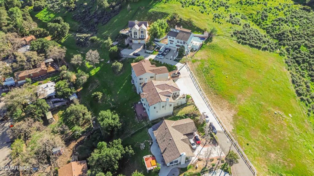 1308 Gonzales Road Simi Valley, CA 93063 - Photo 41 of 48 an aerial view of a house with a yard and lake view