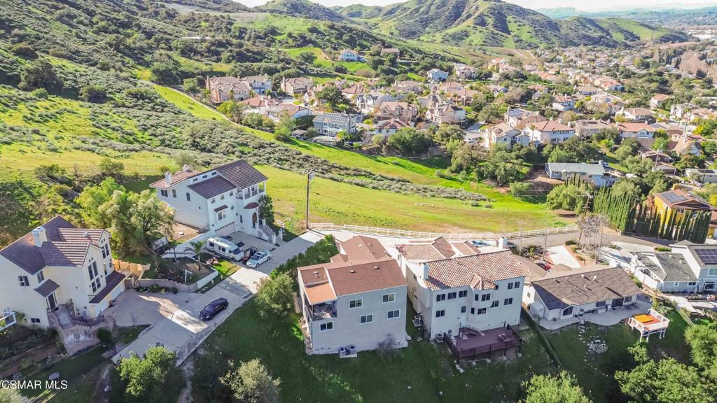 1308 Gonzales Road Simi Valley, CA 93063 - Photo 42 of 48 an aerial view of residential houses with outdoor space