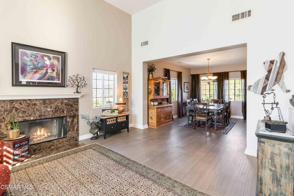 1308 Gonzales Road Simi Valley, CA 93063 - Photo 5 of 48 a living room with furniture and a fireplace