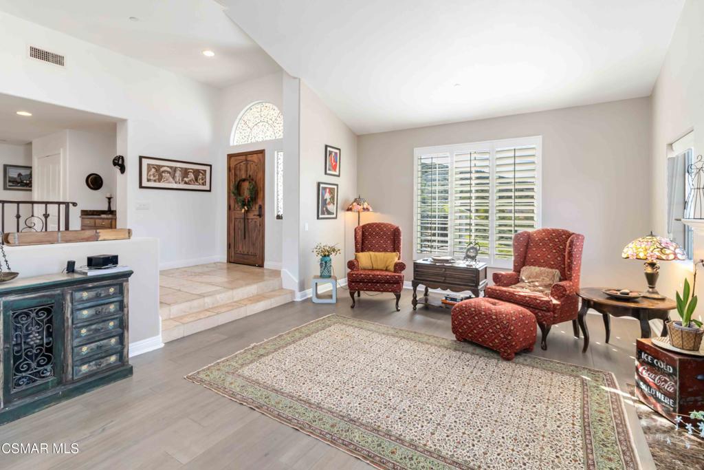 1308 Gonzales Road Simi Valley, CA 93063 - Photo 6 of 48 a living room with furniture and wooden floor