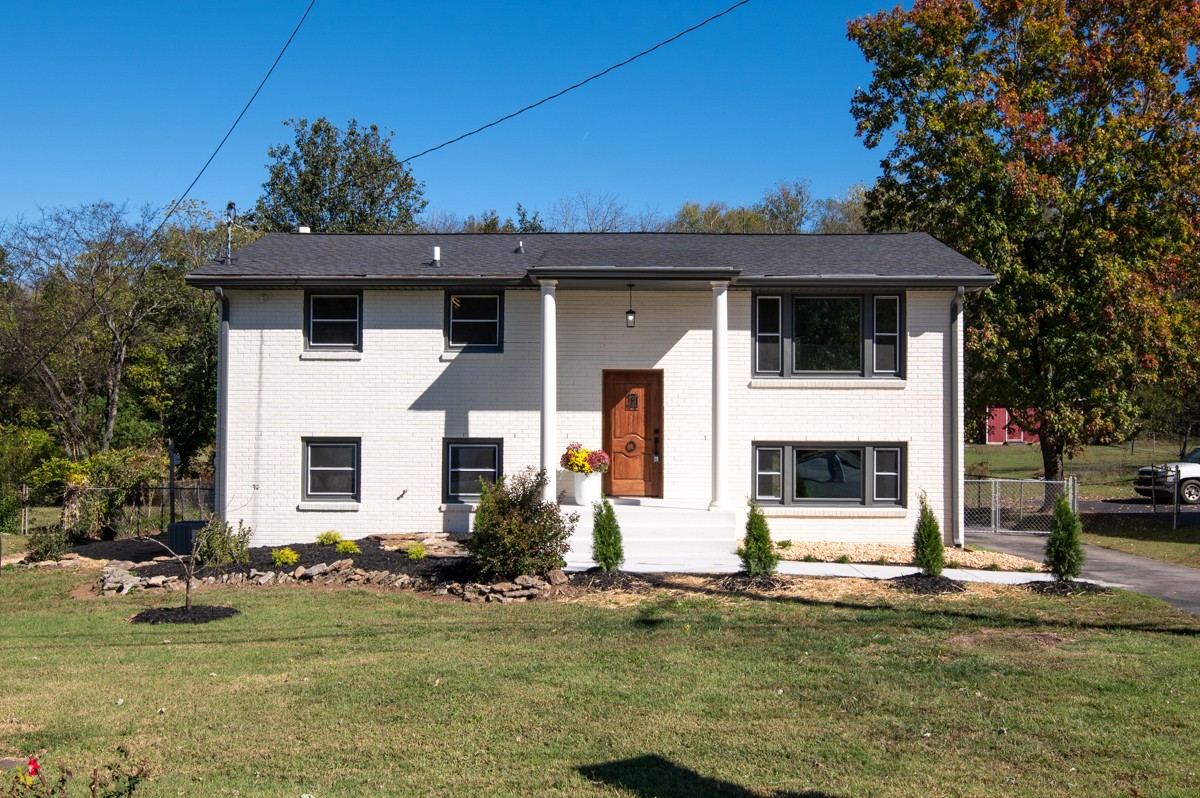 612 May Drive Madison, TN 37115 - Photo 3 of 46 a front view of a house with a yard