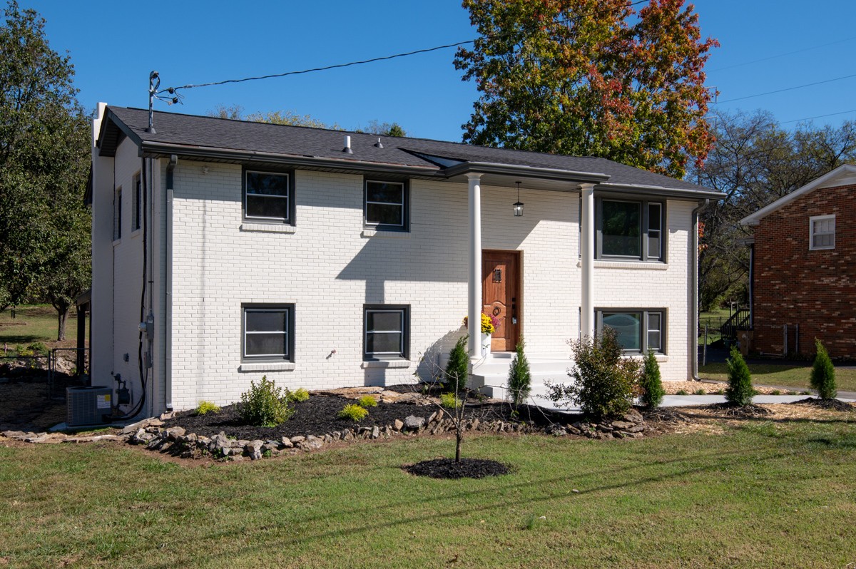 612 May Drive Madison, TN 37115 - Photo 5 of 46 a front view of a house with a yard