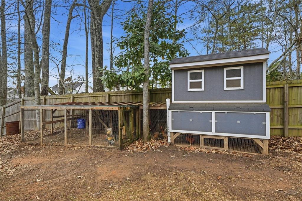1006 Owens Store Road Canton, GA 30115 - Photo 42 of 48 a view of house with outdoor space