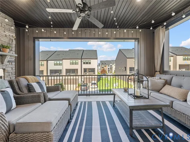 a balcony with furniture