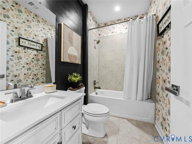 a bed room with a bed and a fireplace