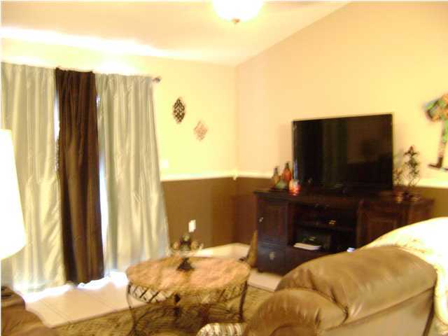 24270 Mcphail Farm Road Florala, AL 36442 - Photo 12 of 25 a bedroom with a bed and television