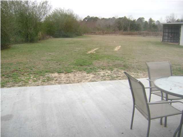 24270 Mcphail Farm Road Florala, AL 36442 - Photo 18 of 25 a view of a lake from a yard