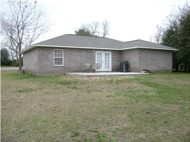 24270 Mcphail Farm Road Florala, AL 36442 - Photo 22 of 25 a front view of a house with a yard