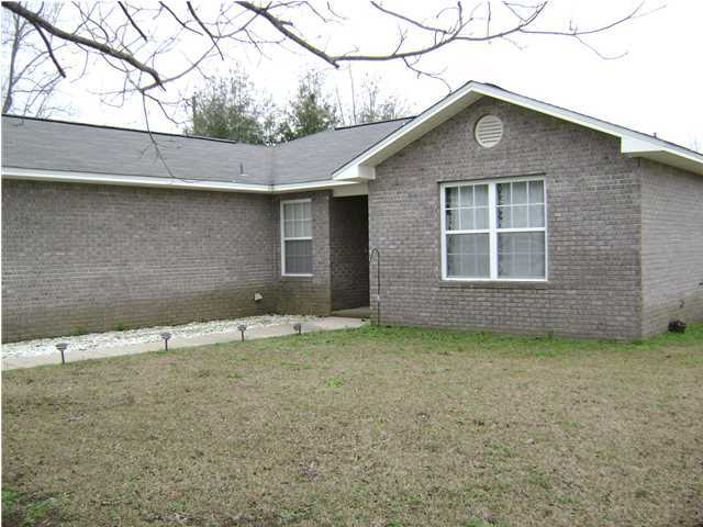 24270 Mcphail Farm Road Florala, AL 36442 - Photo 23 of 25 a house with a outdoor space