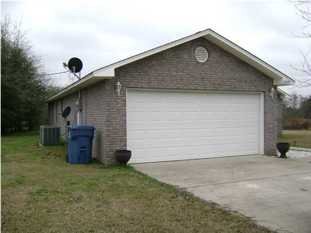 24270 Mcphail Farm Road Florala, AL 36442 - Photo 25 of 25 a front view of a house with a yard