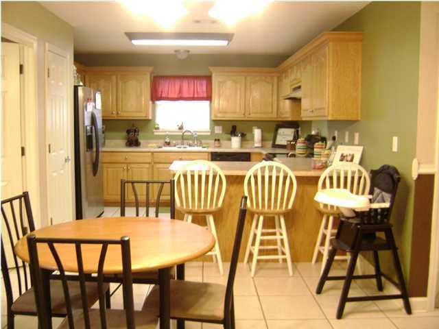 24270 Mcphail Farm Road Florala, AL 36442 - Photo 3 of 25 a view of a dining room with furniture and a kitchen