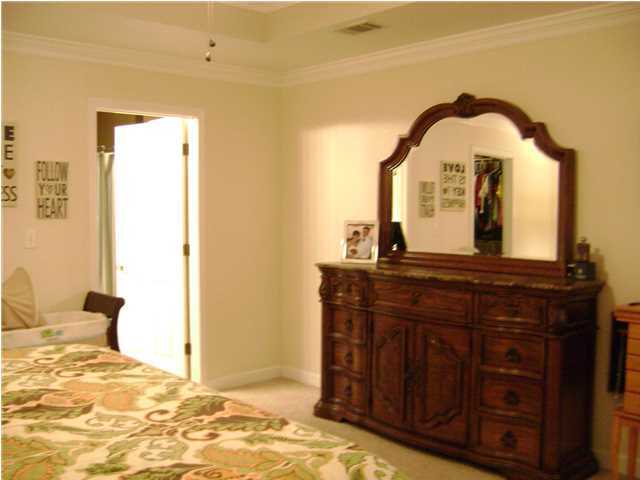 24270 Mcphail Farm Road Florala, AL 36442 - Photo 6 of 25 a view of living room with a bed and dresser