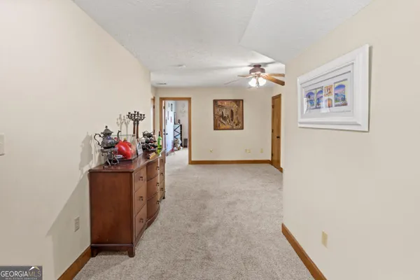 a view of a hallway with workspace