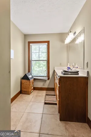 a dining room with a table and a window