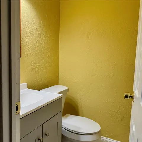 a bathroom with a sink and a toilet