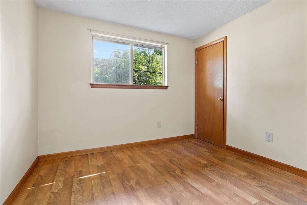 52 Brooks Street Maynard, MA 01754 - Photo 17 of 28 an empty room with window