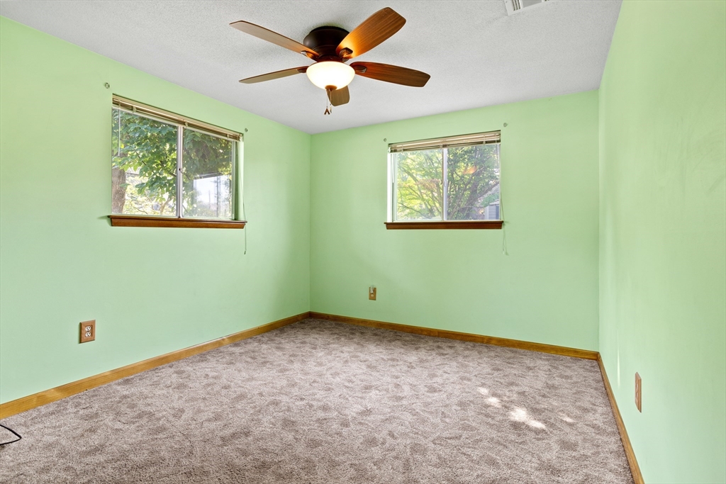 52 Brooks Street Maynard, MA 01754 - Photo 18 of 28 a view of an empty room with a window