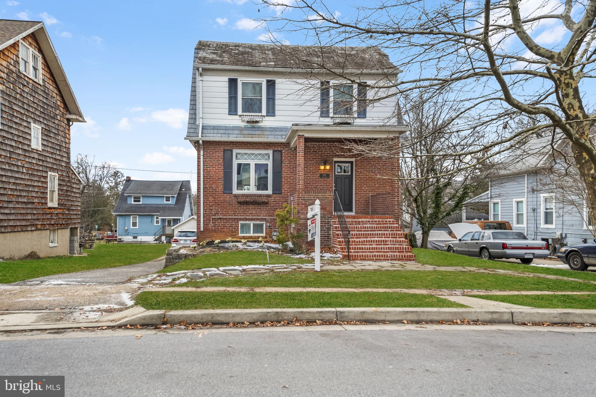 608 North Bend Road Baltimore, MD 21229 - Photo 2 of 31 drive to left to huge parking pad