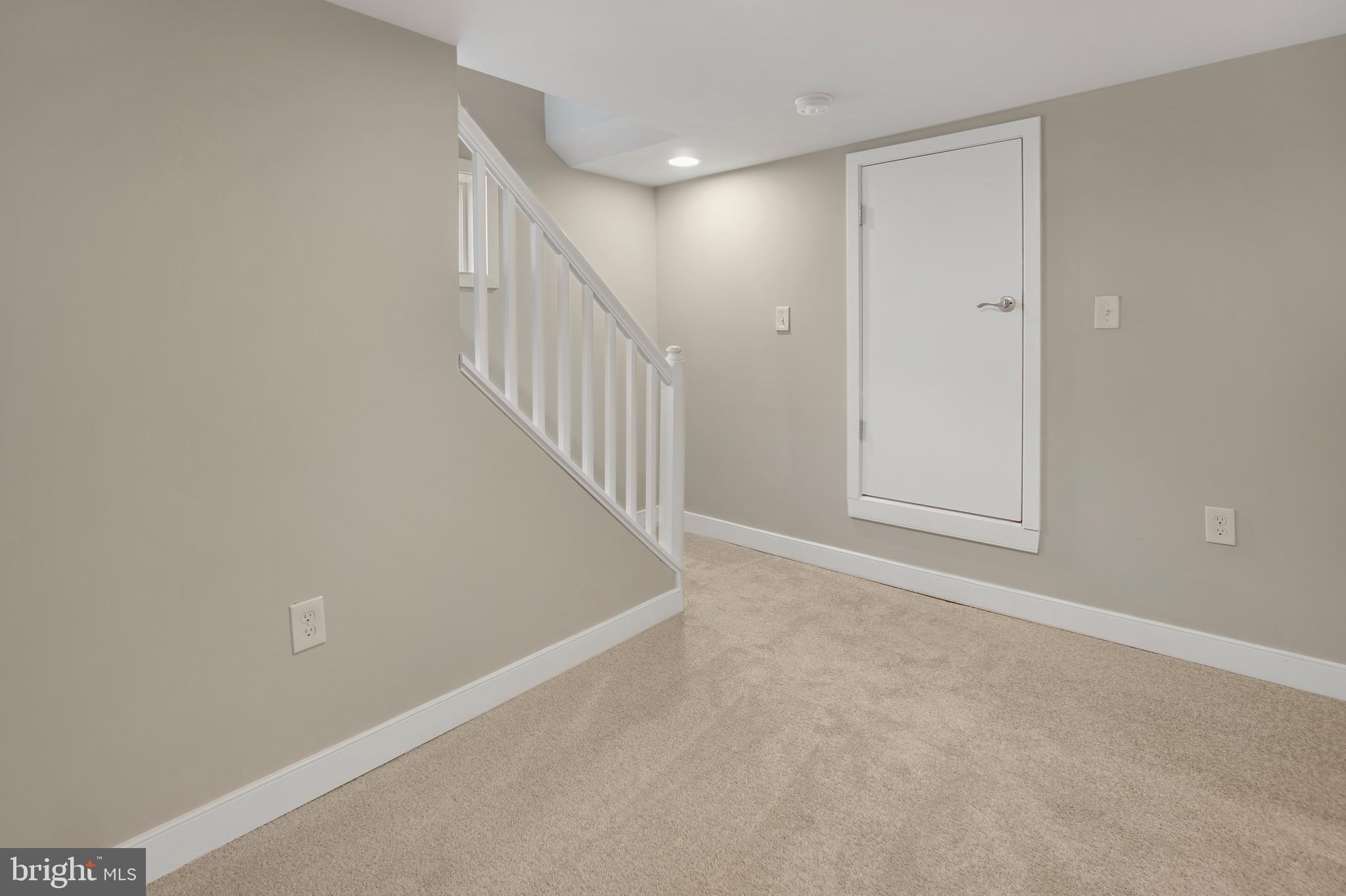 608 North Bend Road Baltimore, MD 21229 - Photo 25 of 31 door to storage also wide hall to bathroom basemen