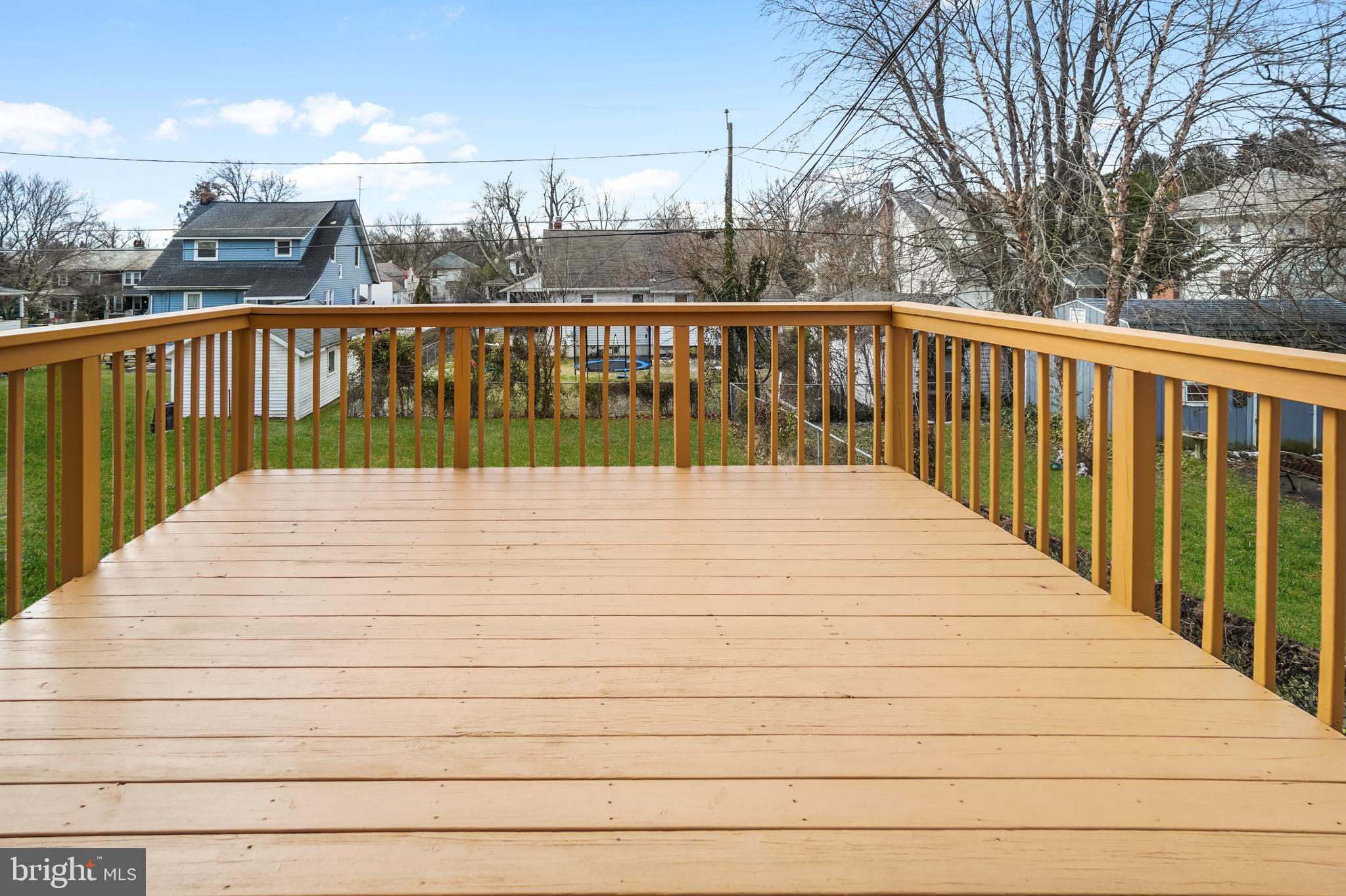 608 North Bend Road Baltimore, MD 21229 - Photo 27 of 31 deck out side kitchen door, steps to lower deck an