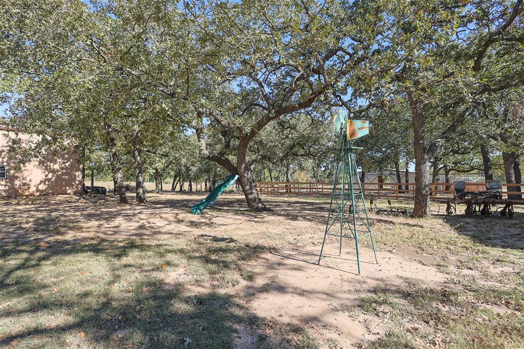 111 Deerfield Road Paradise, TX 76073 - Photo 38 of 39 back yard, lots of trees