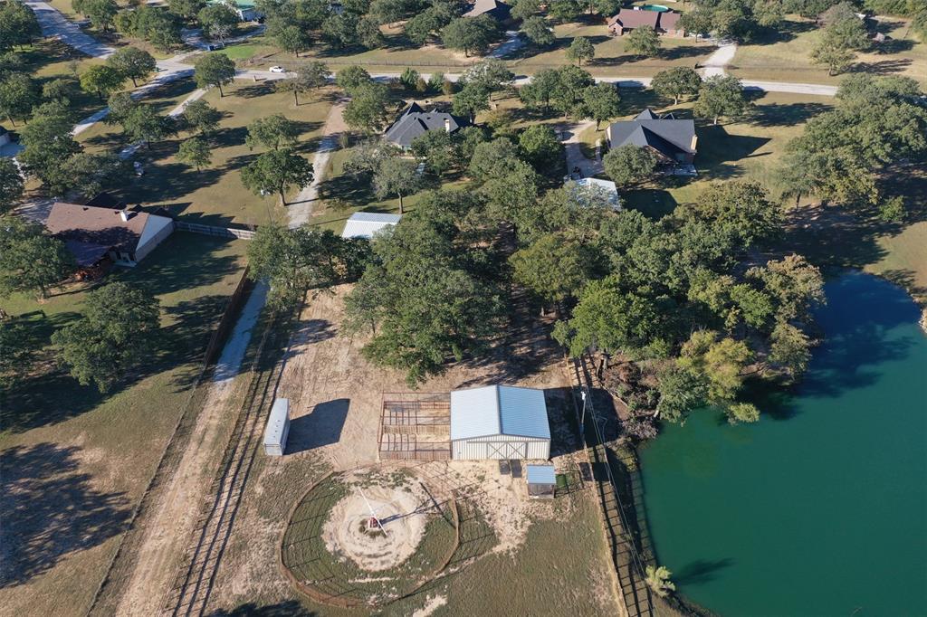 111 Deerfield Road Paradise, TX 76073 - Photo 4 of 39 Aerial view of property and surrounding area featuring a nearby body of water