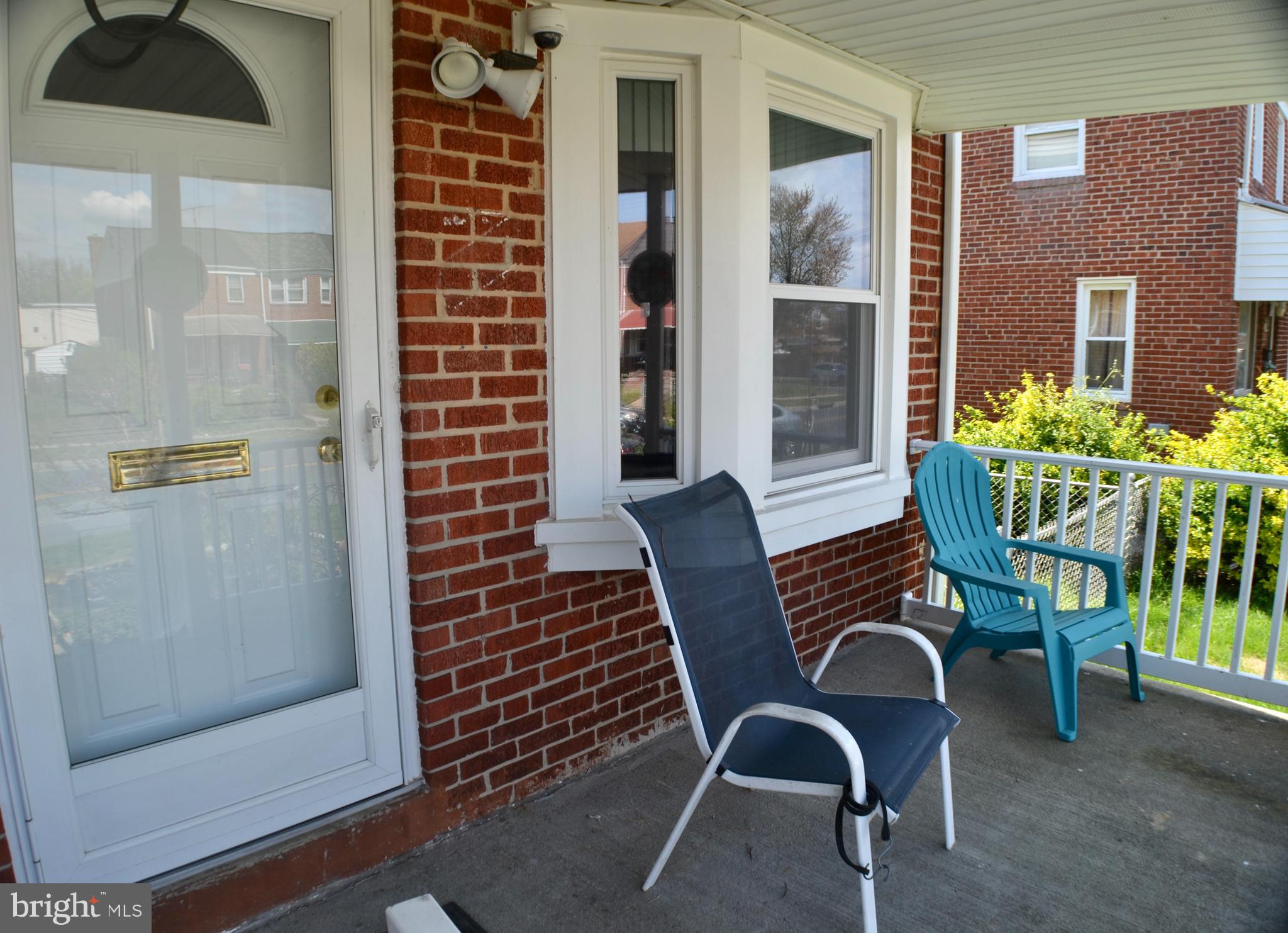 7911 Kavanagh Road Dundalk, MD 21222 - Photo 5 of 23 Spacious Covered Front Porch for Relaxing Nights