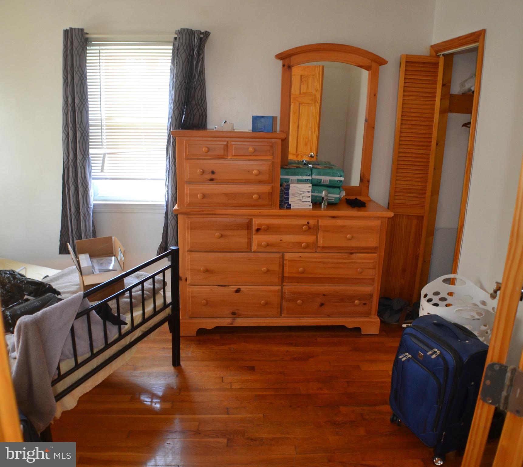 7911 Kavanagh Road Dundalk, MD 21222 - Photo 7 of 23 Spacious Bedroom #1 w/Hardwood Floors, Ceiling Fan