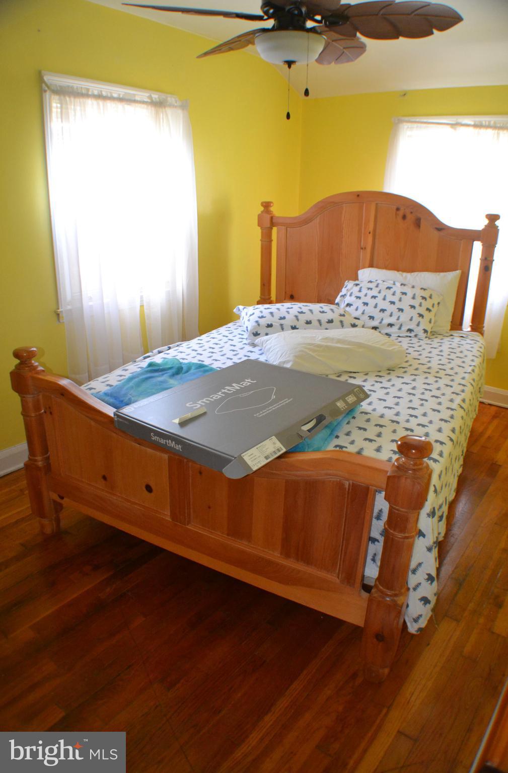 7911 Kavanagh Road Dundalk, MD 21222 - Photo 8 of 23 Bedroom #2 w/Hardwood Floors & Ceiling Fan
