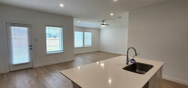 a close view of a sink and a window in a room