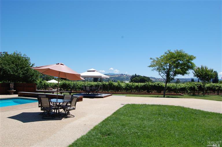 2650 Westside Road Healdsburg, CA 95448 - Photo 1 of 1 a view of swimming pool with outdoor seating and plants