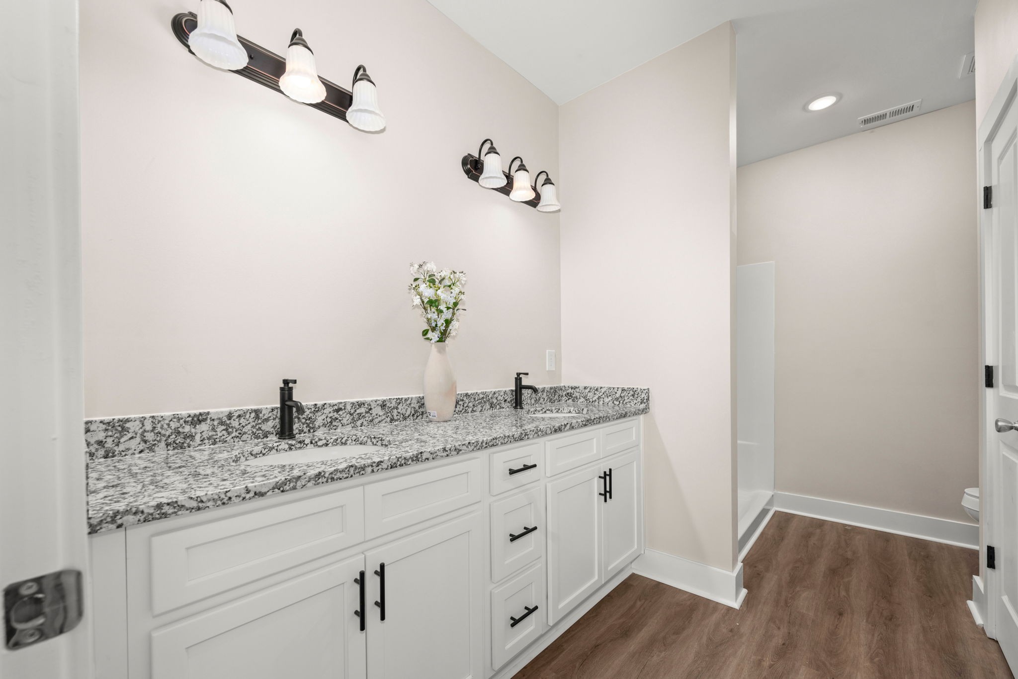 254 Flintville Road Flintville, TN 37335 - Photo 20 of 38 a bathroom with a granite countertop sink and a mirror