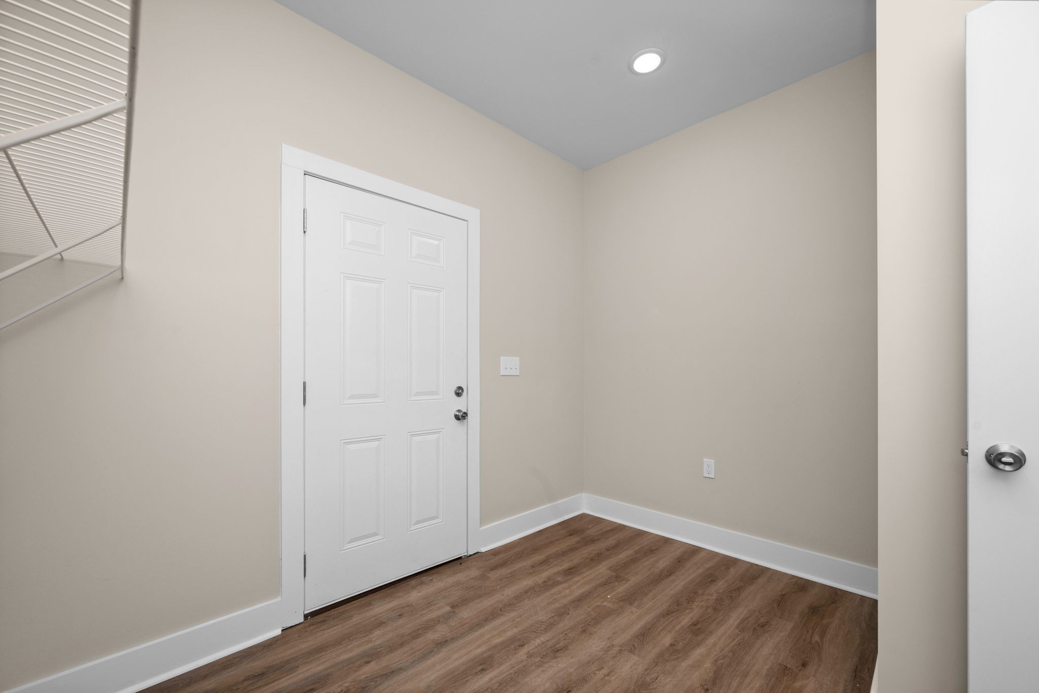 254 Flintville Road Flintville, TN 37335 - Photo 26 of 38 a view of an empty room with wooden floor